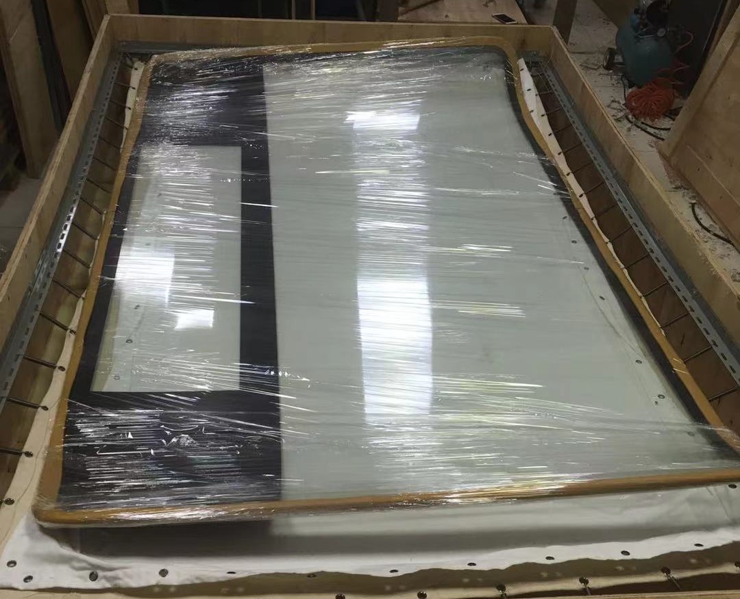 大型鋼化玻璃出口到尼泊爾,彈簧蹦床包裝方案——一次危險(xiǎn)品進(jìn)出口包裝方案的飛躍！